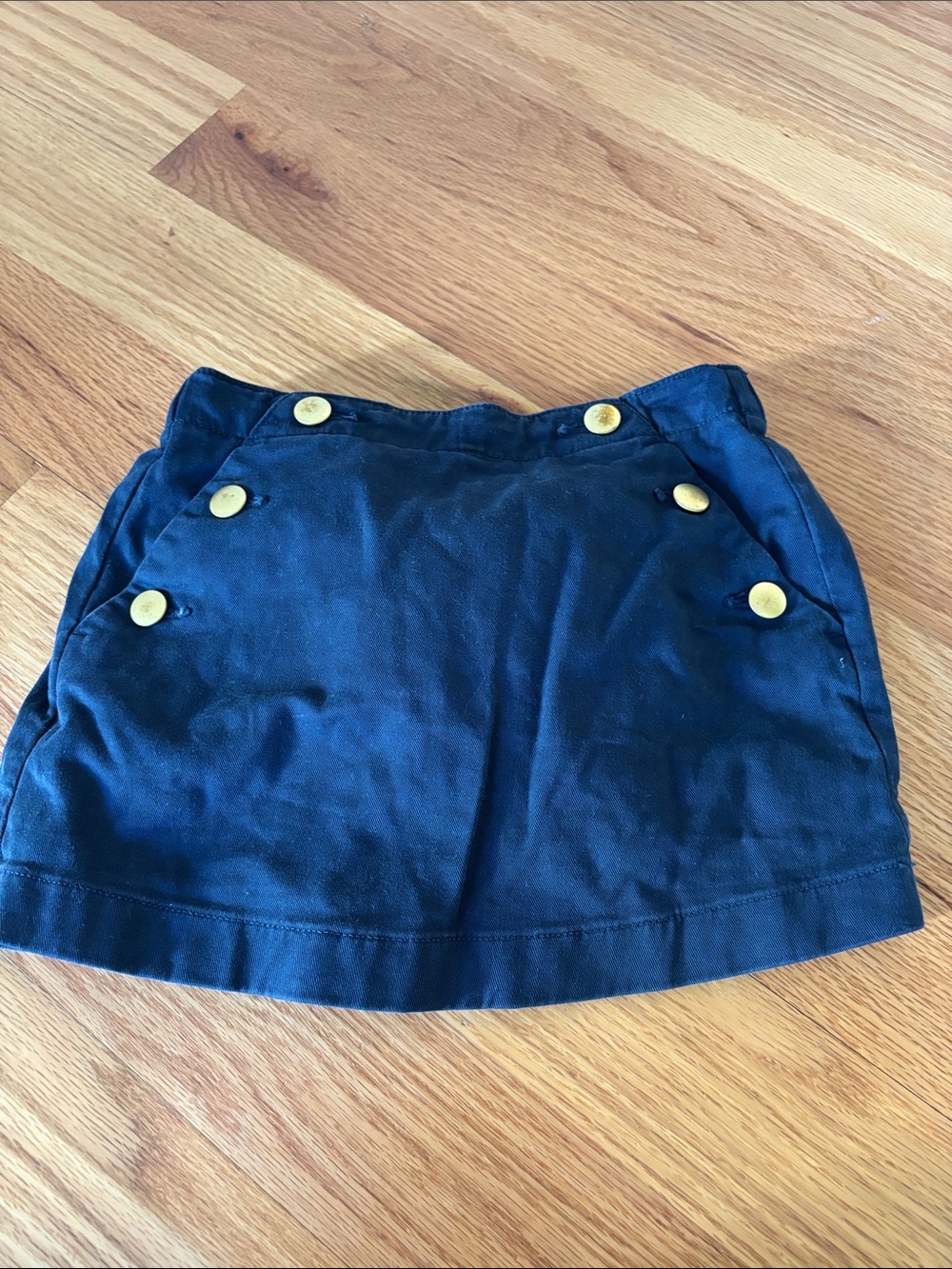 Navy and gold button skort
